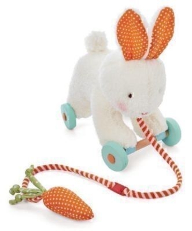 Pull Along Bud Bunny Rabbit by Deva Designs. Part of the Bunnies by the Bay Range distributed by Deva Designs. Wheelie bunny rabbit pull along, plush bunny with embroidered face and bushing tail. The wooden wheels are detachable making him easy to clean